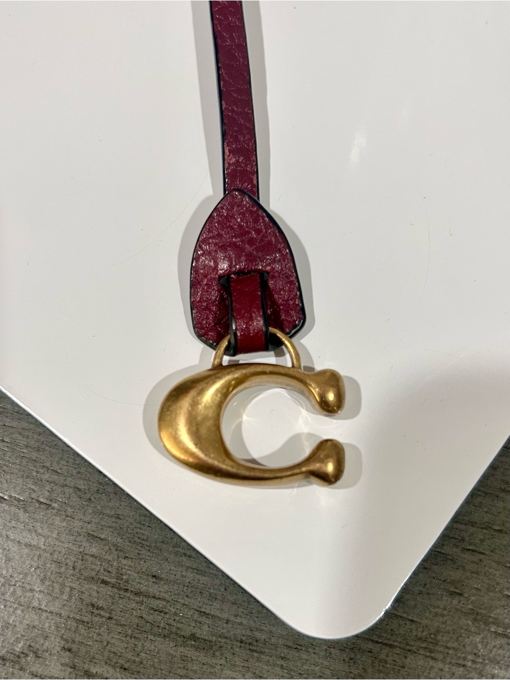 Coach Burgundy Leather Key Charm with Gold 'C' Pendant